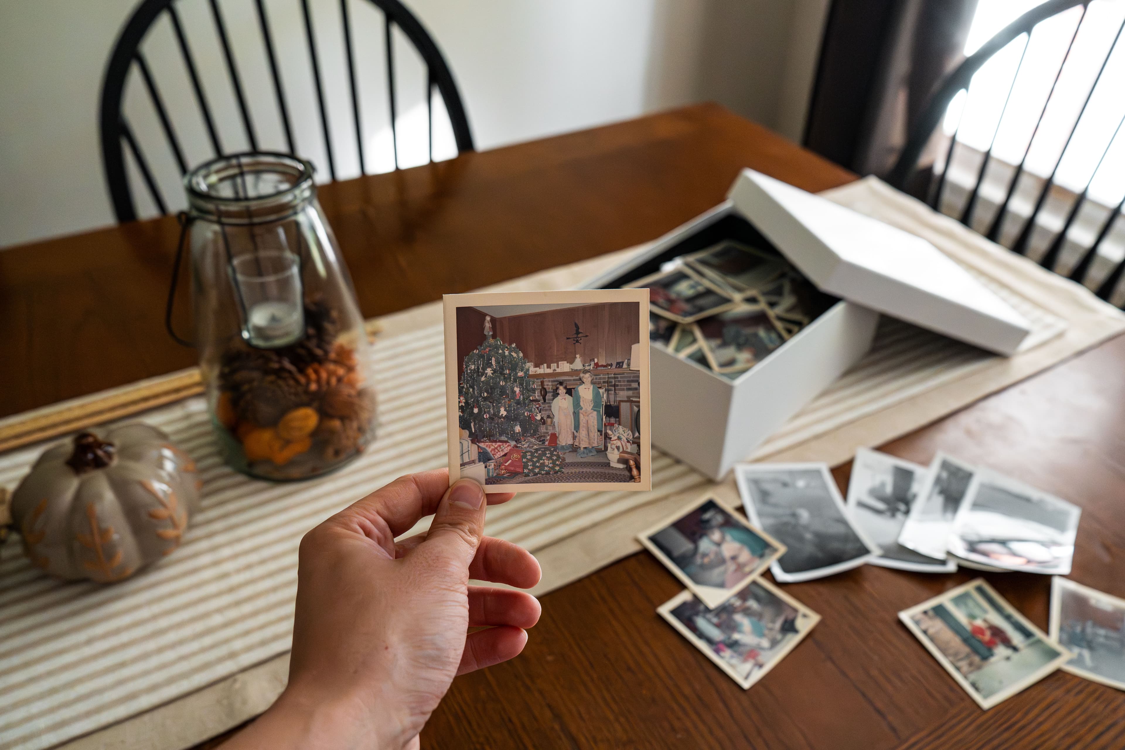 Editorial photograph of vintage family photos and keepsakes